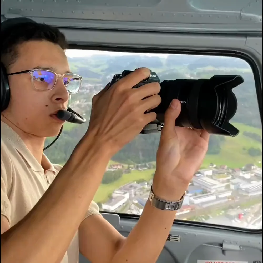 Luis Häberlin filming from a helicopter over Switzerland